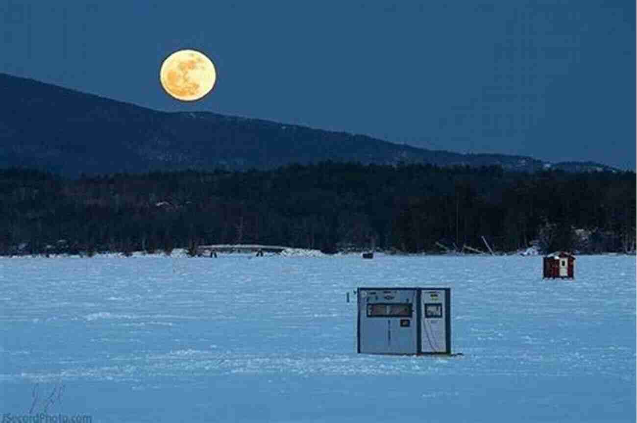 A Frozen Lake With A Full Moon Illuminating Its Smooth, Mirror Like Surface A Night In The Snow