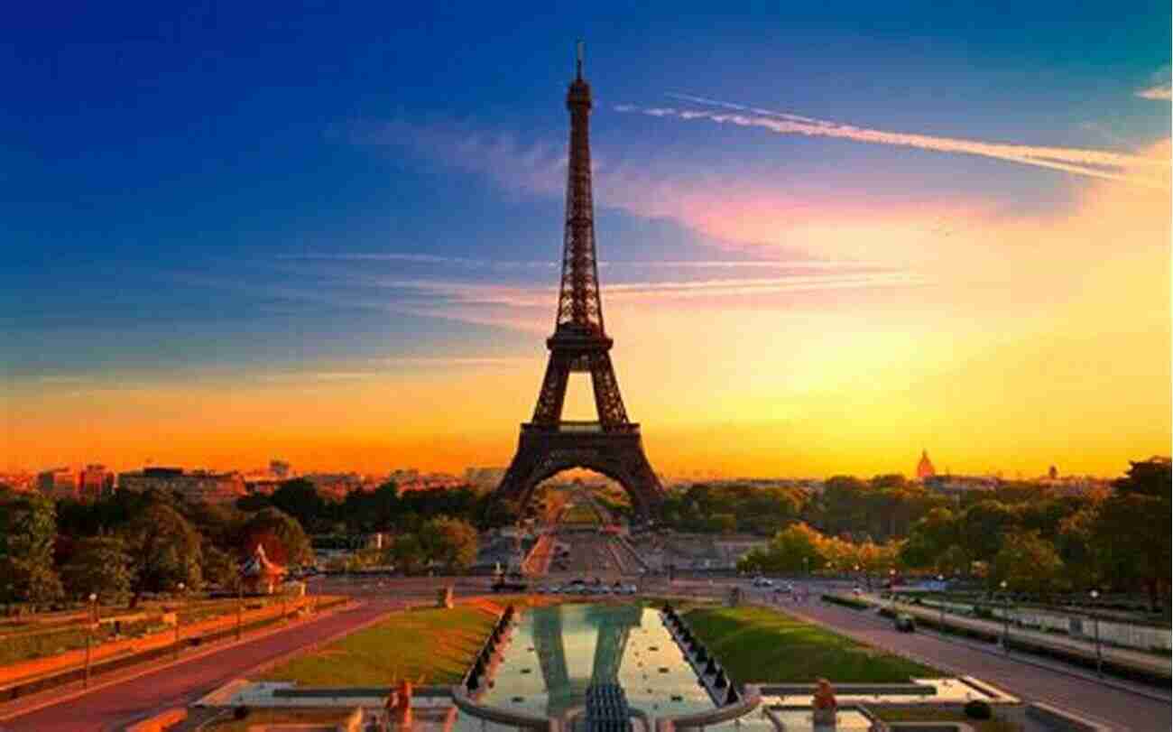 A Mesmerizing Sunset Over The Eiffel Tower In Paris, France Under A Different Sky Joshua Newnham