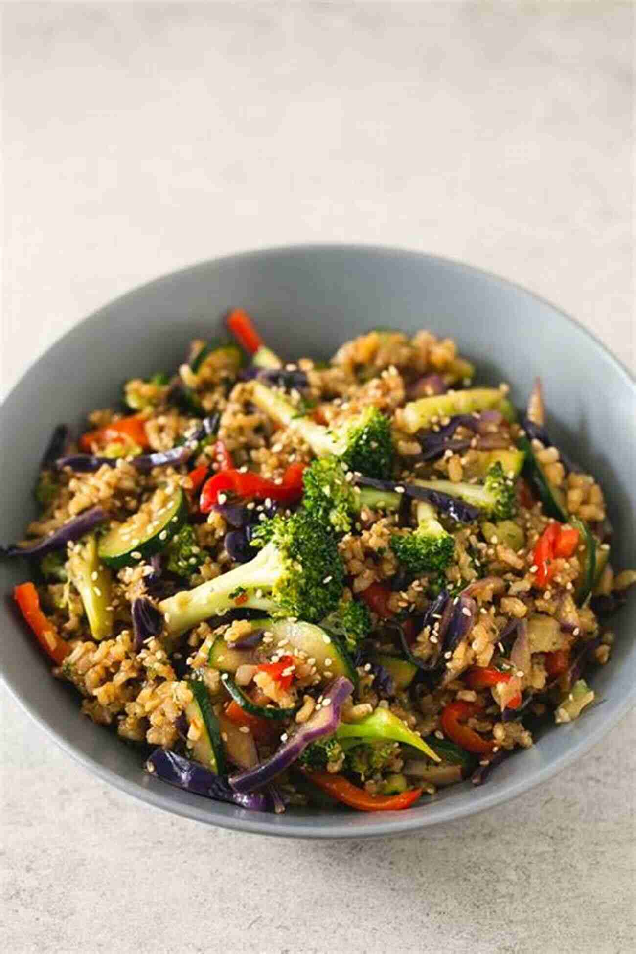 Colorful Vegetable Stir Fry Served With Brown Rice Meal Prep: Quick And Easy Recipes For Rapid Weight Loss And Clean Eating