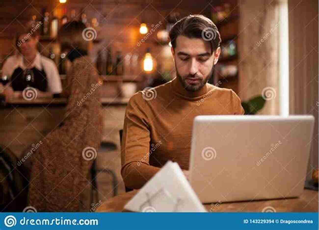 Entrepreneur Working On Laptop In A Coffee Shop Launch A Business In 1 Week (Compilation): 2 Online Business Ideas You Can Start Now Teespring Facebook Ecommerce And YouTube Vlogging For Newbies