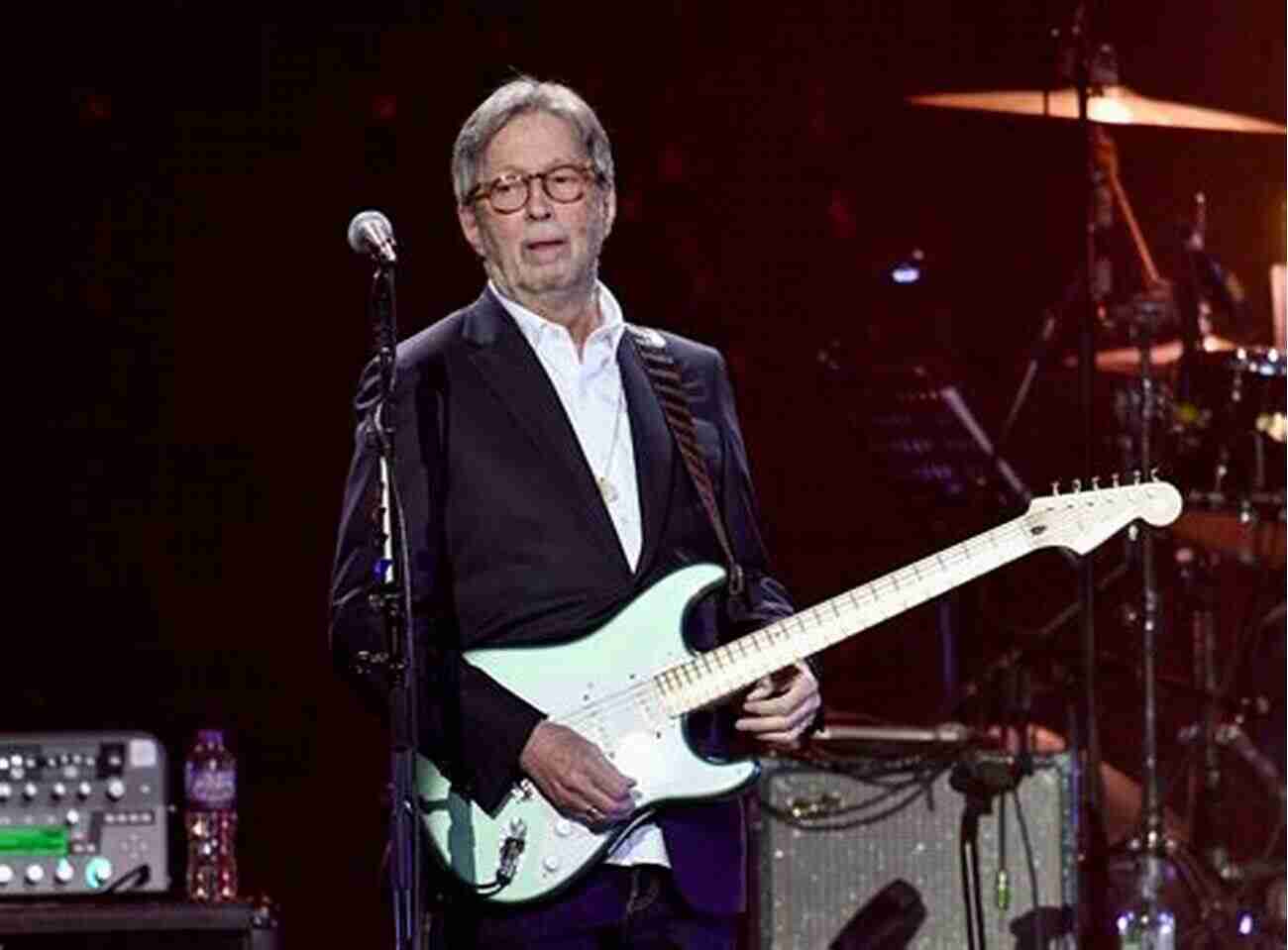 Eric Clapton Playing Guitar On Stage Motherless Child: The Definitive Biography Of Eric Clapton