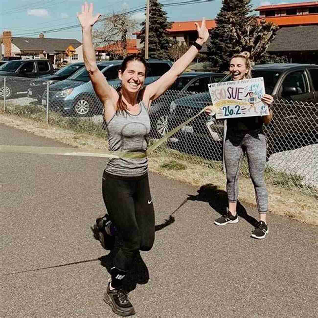 Janna Wagner Standing In Front Of A Cheering Crowd After Completing A Marathon Becoming Tommy Sullivan Janna Wagner