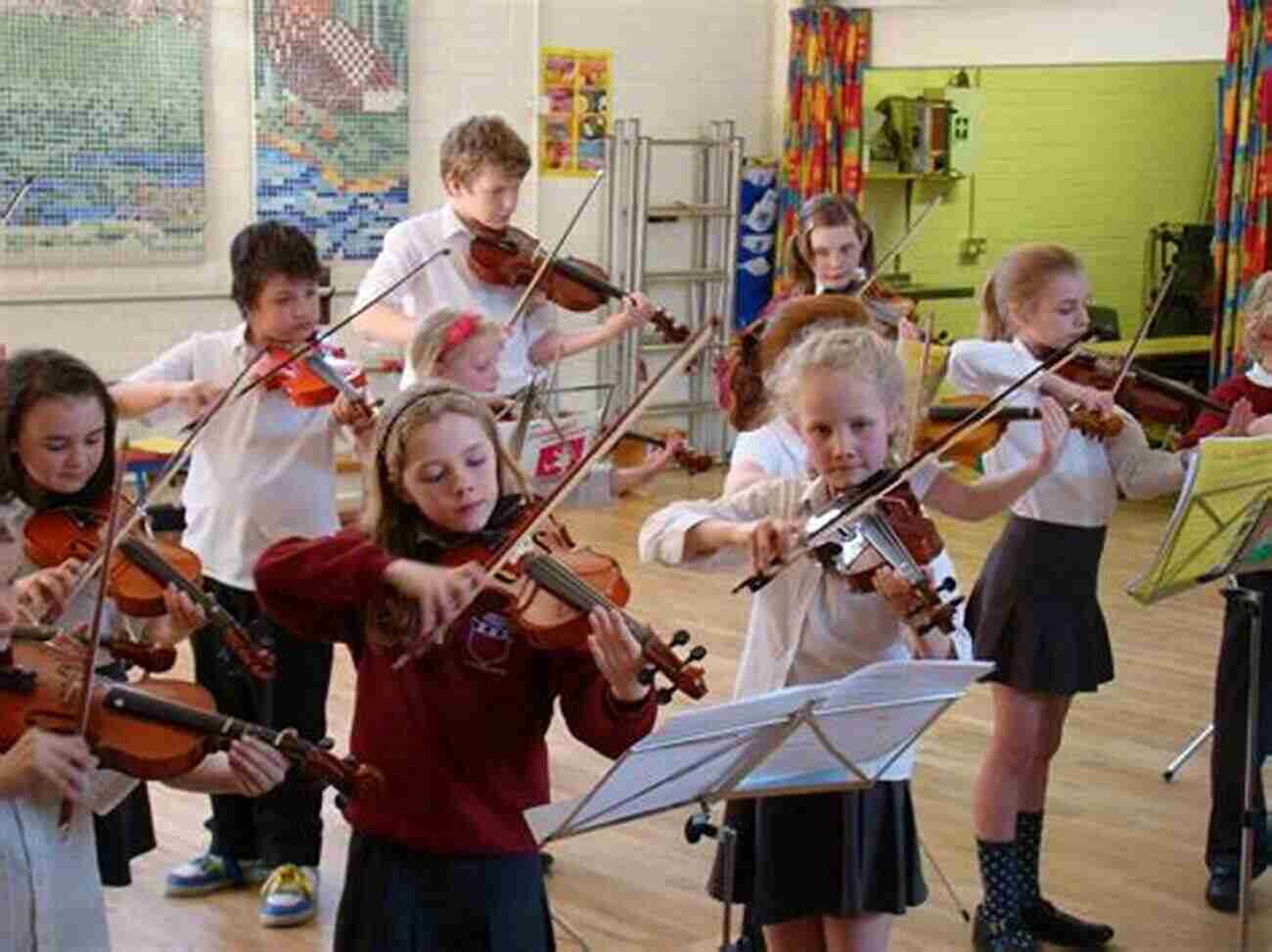 Junhua Xia Playing The Violin At A School Concert Childhood Junhua Xia