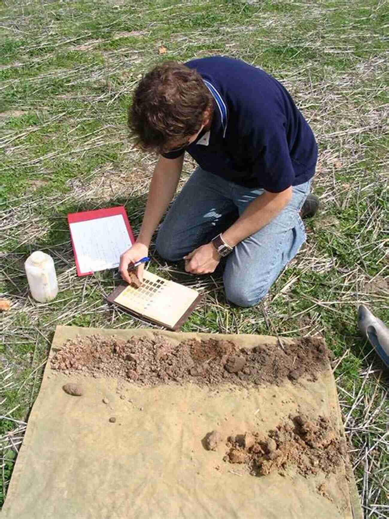 Man Assessing Soil Physical Properties With Agricultural Tools Optimizing The Soil Physical Environment Toward Greater Crop Yields