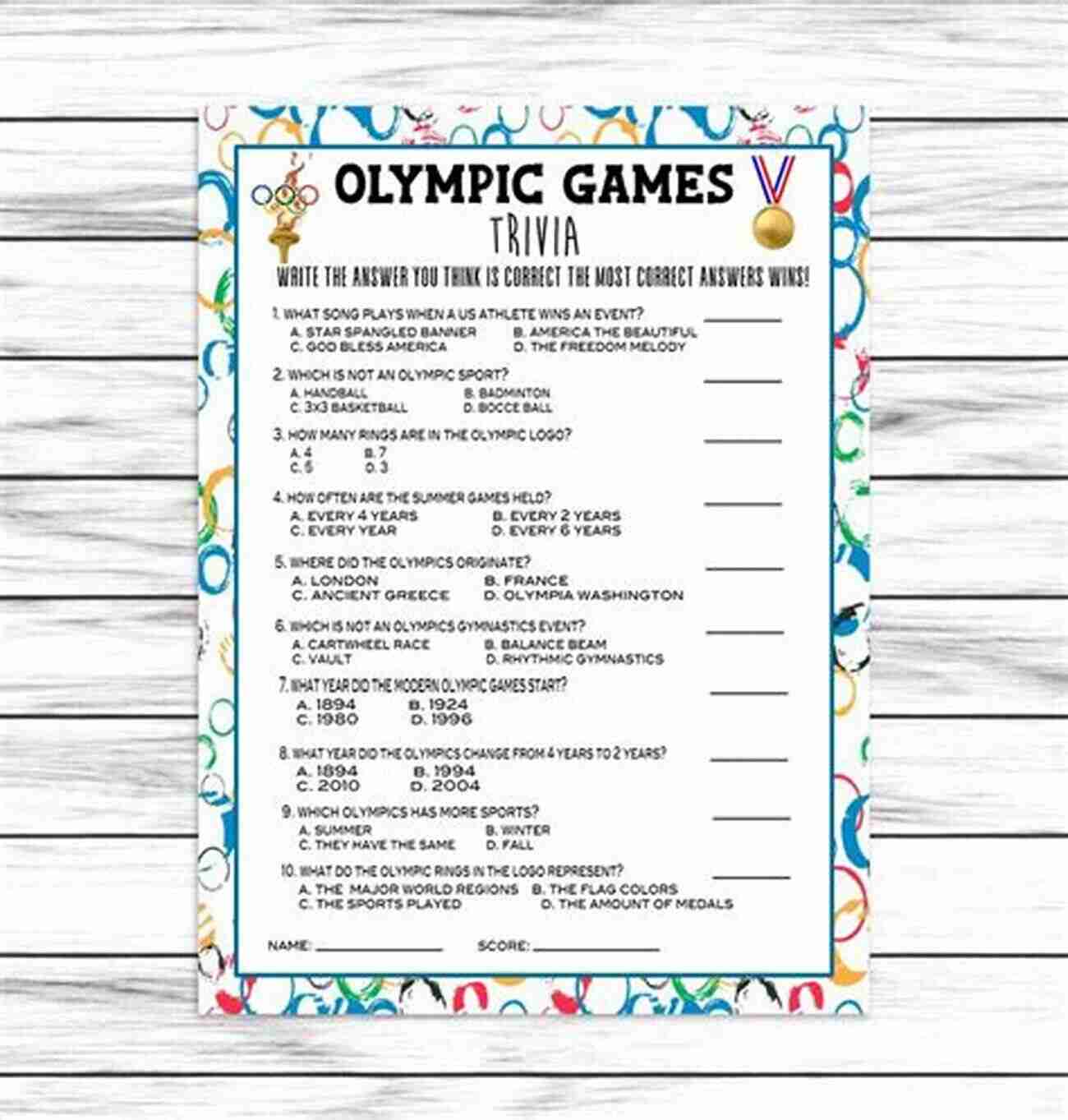 Olympic Stadium THE ULTIMATE OLYMPIC GAMES TRIVIA BOOK: Test Your Knowledge Of The Olympics With 60 Multiple Choice Questions Great Gift For Kids And Adults