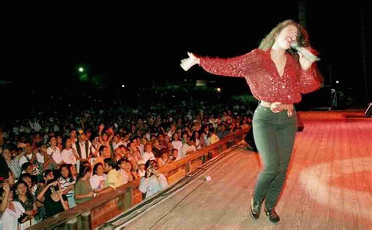 Selena Performing 'La Mucura' With The Accordion Player On Her Side, Creating An Electrifying Atmosphere. Tex Mex Conjunto Classics For Accordion